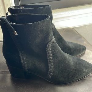 Black suede ankle boots with whip stitch detail.
